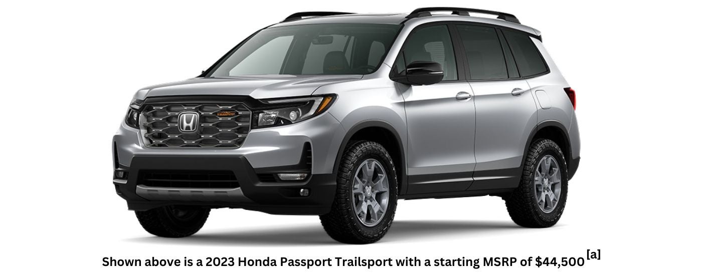 A silver 2023 Honda Passport Trailsport is shown angled left.