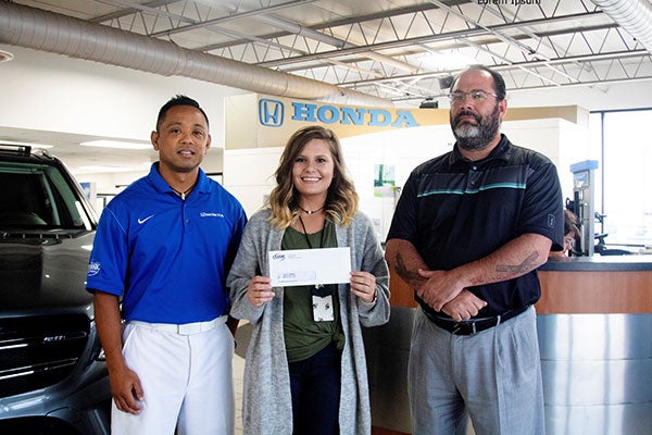 Local Honda Dealership Staff Donating to Teachers